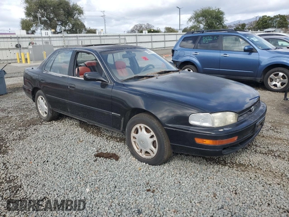 1994 Toyota Camry XLE with VIN JT2GK13E0R0012242, listed as a Copart auction lot 50966775 with 70,922 mi miles and Salvage Title. Bid and sale history available at carsss.com. Image 4.