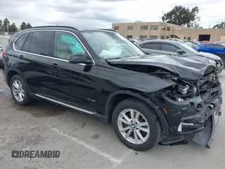 2014 BMW X5 xDrive35i z VIN 5UXKR0C56E0H21373, wystawiony jako IAAI lot #42129797 z przebiegiem 147 227 mil mil oraz . Historia ofert i sprzedaży dostępna na DreamBid. Obrazek 1.