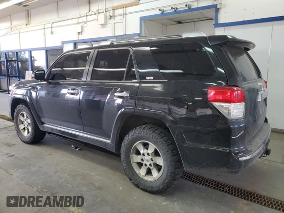 2011 Toyota 4Runner Trail with VIN JTEBU5JR7B5039144, listed as a Copart auction lot 55885955 with 182,980 mi miles and Salvage title. Bid and sale history available at DreamBid. Image 2.