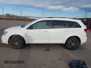 2017 Dodge Journey SE with VIN 3C4PDCAB6HT670624, listed as a IAAI auction lot 41777947 with 143,496 mi miles and . Bid and sale history available at DreamBid. Image 14.