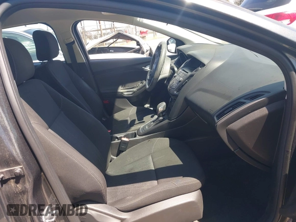 2017 Ford Focus SE z VIN 1FADP3F26HL308880, wystawiony jako IAAI lot #41991909 z przebiegiem 103 403 mil mil oraz . Historia ofert i sprzedaży dostępna na DreamBid. Obrazek 5.