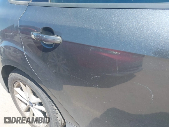 2017 Ford Focus SE z VIN 1FADP3F26HL308880, wystawiony jako IAAI lot #41991909 z przebiegiem 103 403 mil mil oraz . Historia ofert i sprzedaży dostępna na DreamBid. Obrazek 12.