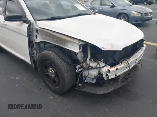 2015 Ford Police Interceptor with VIN 1FAHP2L83FG149326, listed as a IAAI auction lot 42477215 with 90,679 mi miles and . Bid and sale history available at DreamBid. Image 6.