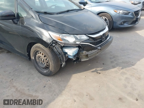 2020 Honda Fit LX z VIN 3HGGK5H40LM717305, wystawiony jako IAAI lot #42093169 z przebiegiem 69 665 mil mil oraz . Historia ofert i sprzedaży dostępna na DreamBid. Obrazek 18.