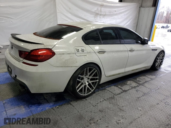 2013 BMW 6 Series 650i with VIN WBA6B2C58DDG66805, listed as a Copart auction lot 44917915 with 135,791 mi miles and Clean Title. Bid and sale history available at DreamBid. Image 3.