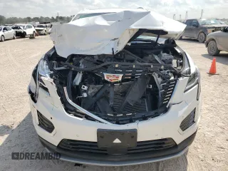 2023 Cadillac XT5 FWD Premium Luxury with VIN 1GYKNCRS7PZ150378, listed as a Copart auction lot 71792184 with 21,631 mi miles and Salvage Title. Bid and sale history available at carsss.com. Image 5.