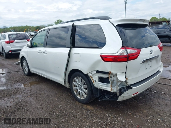 2015 Toyota Sienna XLE with VIN 5TDYK3DC3FS529256, listed as a IAAI auction lot 42172570 with 163,725 mi miles and . Bid and sale history available at carsss.com. Image 3.