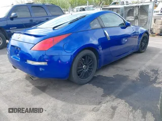 2003 Nissan 350Z Touring with VIN JN1AZ34E23T012447, listed as a IAAI auction lot 41994211 with 180,402 mi miles and . Bid and sale history available at DreamBid. Image 4.