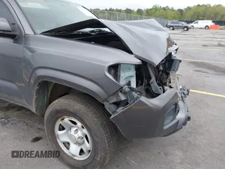 2017 Toyota Tacoma SR z VIN 5TFAX5GN7HX090832, wystawiony jako IAAI lot #41903374 z przebiegiem 234 499 mil mil oraz . Historia ofert i sprzedaży dostępna na DreamBid. Obrazek 17.
