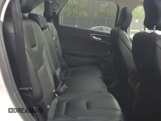 2017 Ford Edge Titanium z VIN 2FMPK4K80HBC30050, wystawiony jako Copart lot #54122585 z przebiegiem 58 023 mil mil oraz Szkoda całkowita • Salvage title. Historia ofert i sprzedaży dostępna na DreamBid. Obrazek 11.