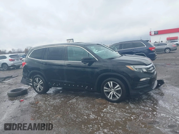 2016 Honda Pilot EX-L with VIN 5FNYF5H56GB031831, listed as a IAAI auction lot 41111342 with 244,197 mi miles and . Bid and sale history available at DreamBid. Image 13.