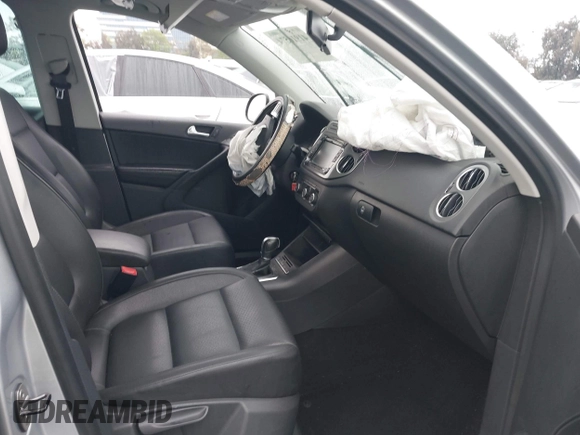2011 Volkswagen Tiguan SEL w/Premium Navi with VIN WVGAV7AX7BW547613, listed as a IAAI auction lot 41916574 with 140,385 mi miles and . Bid and sale history available at DreamBid. Image 5.