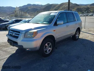 2006 Honda Pilot EX-L with VIN 5FNYF28576B044908, listed as a IAAI auction lot 41396638 with 150,540 mi miles. Bid and sale history available at carsss.com. Image 2.
