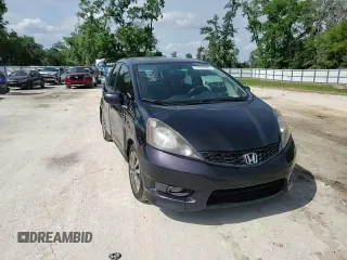 2013 Honda Fit Sport with VIN JHMGE8H57DC004712, listed as a Copart auction lot 51426885 with 203,217 mi miles and Salvage Title. Bid and sale history available at carsss.com. Image 13.