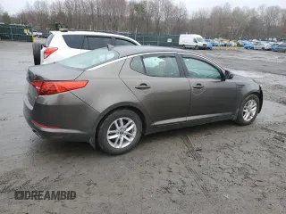 2011 Kia Optima LX z VIN KNAGM4A75B5173585, wystawiony jako Copart lot #51895325 z przebiegiem 137 318 mil mil oraz Szkoda całkowita • Salvage title. Historia ofert i sprzedaży dostępna na DreamBid. Obrazek 3.