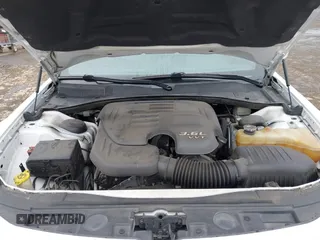 2014 Chrysler 300 with VIN 2C3CCAAG2EH235495, listed as a IAAI auction lot 41787801 with 142,354 mi miles and . Bid and sale history available at DreamBid. Image 10.