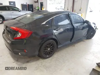 2016 Honda Civic Sedan LX with VIN 19XFC2F59GE017820, listed as a IAAI auction lot 41406871 with 126,376 mi miles. Bid and sale history available at carsss.com. Image 4.