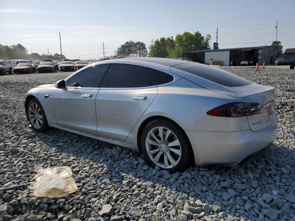 2017 Tesla Model S 60 with VIN 5YJSA1E15HF203248, listed as a Copart auction lot 54923855 with 84,214 mi miles and Salvage title. Bid and sale history available at DreamBid. Image 2.