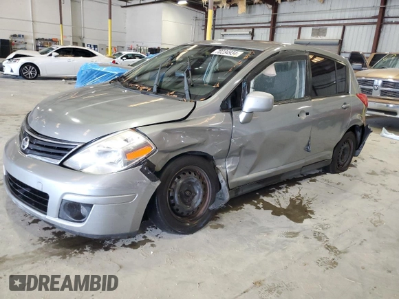 2012 Nissan Versa S with VIN 3N1BC1CP3CK202541, listed as a Copart auction lot 70234934 with 214,607 mi miles and Salvage Title. Bid and sale history available at carsss.com. Image 1.