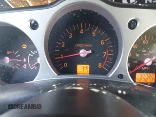 2004 Nissan 350Z Enthusiast z VIN JN1AZ34D74T164233, wystawiony jako IAAI lot #42509421 z przebiegiem 90 780 mil mil oraz . Historia ofert i sprzedaży dostępna na DreamBid. Obrazek 7.