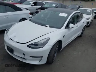2022 Tesla Model 3 with VIN 5YJ3E1EA7NF108758, listed as a IAAI auction lot 41824437 with Not Provided miles. Bid and sale history available at carsss.com. Image 2.
