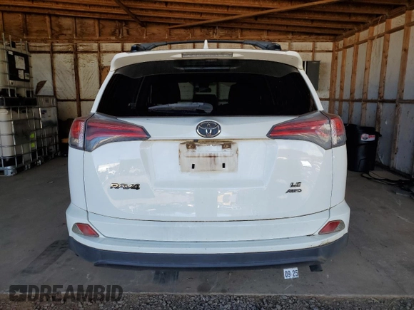 2017 Toyota RAV4 LE with VIN JTMBFREV7HJ148815, listed as a Copart auction lot 82632724 with 24,775 mi miles and Salvage Title. Bid and sale history available at DreamBid. Image 6.