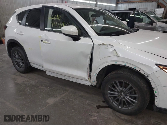 2017 Mazda CX-5 Touring with VIN JM3KFBCL9H0107589, listed as a IAAI auction lot 41241481 with 77,032 mi miles. Bid and sale history available at carsss.com. Image 18.