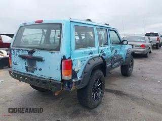 1997 Jeep Cherokee SE z VIN 1J4FJ28S3VL573144, wystawiony jako IAAI lot #41965201 z przebiegiem 298 276 mil mil oraz . Historia ofert i sprzedaży dostępna na DreamBid. Obrazek 4.