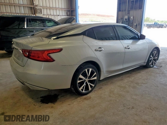 2016 Nissan Maxima Platinum z VIN 1N4AA6AP7GC440845, wystawiony jako Copart lot #60260945 z przebiegiem 129 669 mil mil oraz Szkoda całkowita • Salvage title. Historia ofert i sprzedaży dostępna na DreamBid. Obrazek 3.
