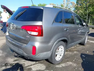 2014 Kia Sorento LX with VIN 5XYKTCA63EG506217, listed as a IAAI auction lot 42050413 with 126,806 mi miles and . Bid and sale history available at carsss.com. Image 4.
