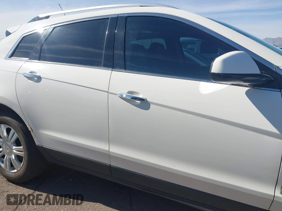 2012 Cadillac SRX Luxury Collection z VIN 3GYFNAE32CS518428, wystawiony jako IAAI lot #42153391 z przebiegiem 159 836 mil mil oraz . Historia ofert i sprzedaży dostępna na DreamBid. Obrazek 14.