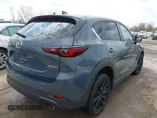 2022 Mazda CX-5 S Preferred with VIN JM3KFBCM2N0528204, listed as a IAAI auction lot 42054842 with 32,066 mi miles and . Bid and sale history available at carsss.com. Image 4.