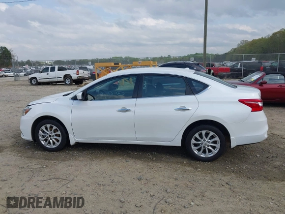 2018 Nissan Sentra S with VIN 3N1AB7AP2JY209169, listed as a IAAI auction lot 41942284 with 123,028 mi miles and . Bid and sale history available at DreamBid. Image 14.
