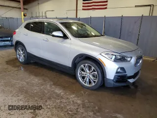 2019 BMW X2 sDrive28i with VIN WBXYJ3C5XKEP77142, listed as a Copart auction lot 50046455 with 88,495 mi miles and Salvage title. Bid and sale history available at DreamBid. Image 4.
