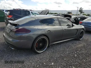 2016 Porsche Panamera 4 z VIN WP0AA2A74GL006367, wystawiony jako Copart lot #49026323 z przebiegiem 57 384 mil mil oraz . Historia ofert i sprzedaży dostępna na DreamBid. Obrazek 3.