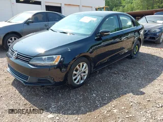 2013 Volkswagen Jetta SE with VIN 3VWDX7AJ8DM285270, listed as a IAAI auction lot 42328752 with 181,942 mi miles and . Bid and sale history available at DreamBid. Image 2.