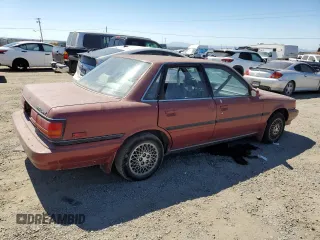 1990 Toyota Camry LE ECT z VIN JT2SV22E0L0351440, wystawiony jako Copart lot #70768614 z przebiegiem 176 239 mil mil oraz Szkoda całkowita • Salvage title. Historia ofert i sprzedaży dostępna na DreamBid. Obrazek 3.