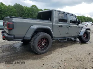 2021 Jeep Gladiator Rubicon с VIN 1C6JJTBG5ML507579, выставлен на аукционе Copart как лот 60409785 с пробегом 62 585 миль миль и Списание • Salvage title. История ставок и продаж доступна на DreamBid. Изображение 3.
