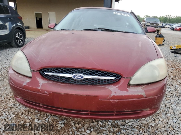 2000 Ford Taurus SES with VIN 1FAFP55U1YA262488, listed as a Copart auction lot 52312645 with 128,621 mi miles and Salvage Title. Bid and sale history available at DreamBid. Image 5.