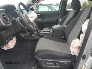 2020 Toyota Tacoma SR5 with VIN 3TMAZ5CNXLM121344, listed as a Copart auction lot 59393395 with 69,902 mi miles and Salvage title. Bid and sale history available at DreamBid. Image 7.