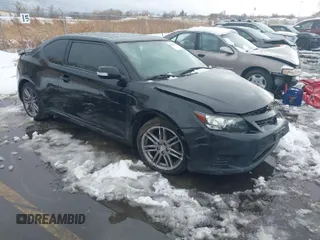 2013 Scion tC with VIN JTKJF5C72D3055801, listed as a IAAI auction lot 41102753 with 242,146 mi miles. Bid and sale history available at carsss.com. Image 1.