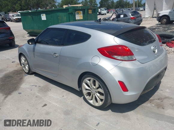 2012 Hyundai Veloster w/Gray Int with VIN KMHTC6ADXCU028115, listed as a IAAI auction lot 42361550 with 118,920 mi miles and . Bid and sale history available at DreamBid. Image 3.