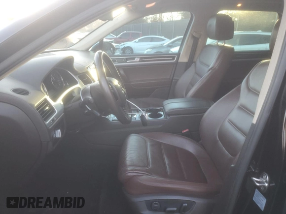 2013 Volkswagen Touareg Lux with VIN WVGEF9BP1DD001025, listed as a Copart auction lot 83784314 with 205,871 mi miles and Salvage Title. Bid and sale history available at DreamBid. Image 7.