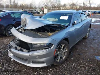 2016 Dodge Charger SXT with VIN 2C3CDXJG5GH328451, listed as a IAAI auction lot 41795674 with 88,965 mi miles. Bid and sale history available at carsss.com. Image 2.