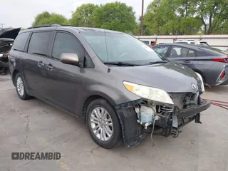 2011 Toyota Sienna XLE AAS with VIN 5TDYK3DC1BS136012, listed as a IAAI auction lot 41869637 with 231,418 mi miles. Bid and sale history available at carsss.com. Image 1.