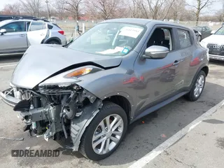 2015 Nissan Juke SV with VIN JN8AF5MVXFT553675, listed as a IAAI auction lot 41815944 with 100,000 mi miles and . Bid and sale history available at DreamBid. Image 18.