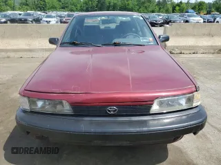 1991 Toyota Camry z VIN 4T1SV24E2MU387012, wystawiony jako Copart lot #57576164 z przebiegiem 117 436 mil mil oraz Nie do naprawy • Non repairable. Historia ofert i sprzedaży dostępna na DreamBid. Obrazek 5.