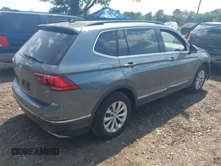 2018 Volkswagen Tiguan SEL with VIN 3VV2B7AX8JM068960, listed as a IAAI auction lot 42528062 with 84,644 mi miles and . Bid and sale history available at DreamBid. Image 4.