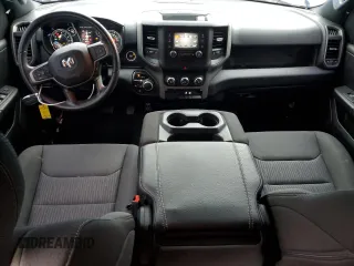 2023 Ram 1500 Tradesman with VIN 1C6SRFGT1PN666130, listed as a Copart auction lot 69990804 with 2,229 mi miles and Salvage title. Bid and sale history available at DreamBid. Image 8.