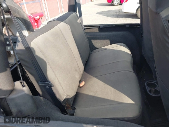 2003 Jeep Wrangler Sport with VIN 1J4FA49S23P328867, listed as a IAAI auction lot 41354414 with 96,703 mi miles. Bid and sale history available at carsss.com. Image 8.
